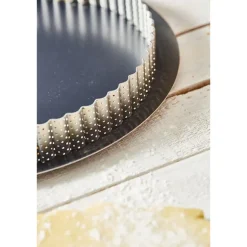 Cercle à tarte perforé cannelé acier inoxydable 28 cm De Buyer