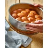 Moule à manqué amovible en inox perforé 24 cm et feuille de cuisson antiadhésive De Buyer