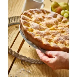 Moule à tarte amovible 28 cm inox perforé et feuille de cuisson antiadhésive De Buyer